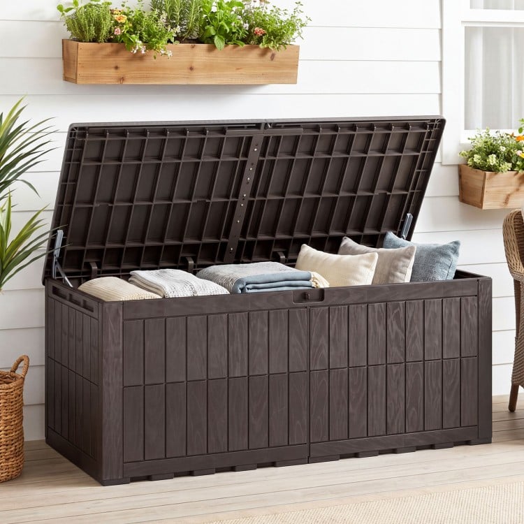 Brown 180 Gal outdoor deck box with lid, handles, and wicker texture for secure storage and extra seating.