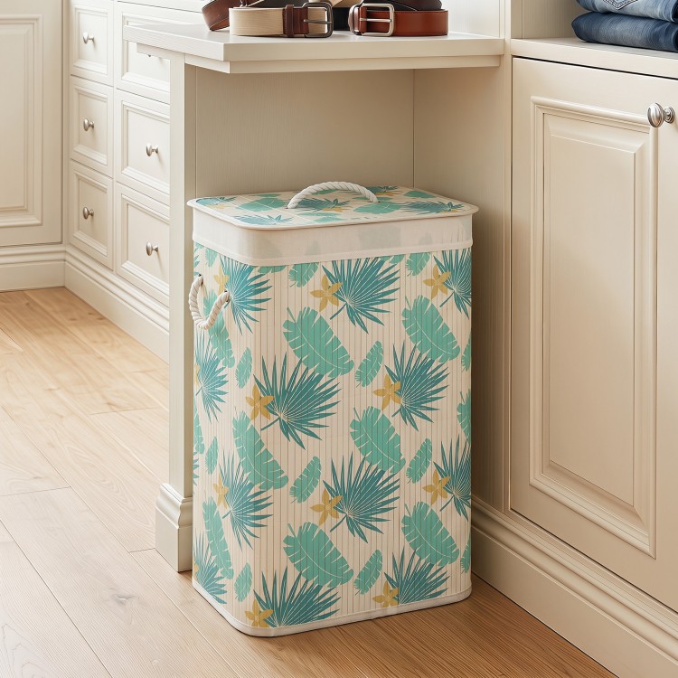 Bamboo clothes hamper with removable liner, featuring a green rainforest pattern, ideal for laundry room or bedroom use.