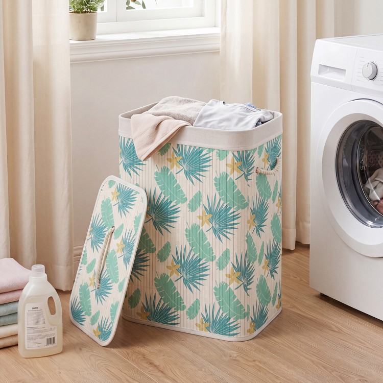 Bamboo clothes hamper with removable liner, featuring a green rainforest pattern, ideal for laundry room organization.