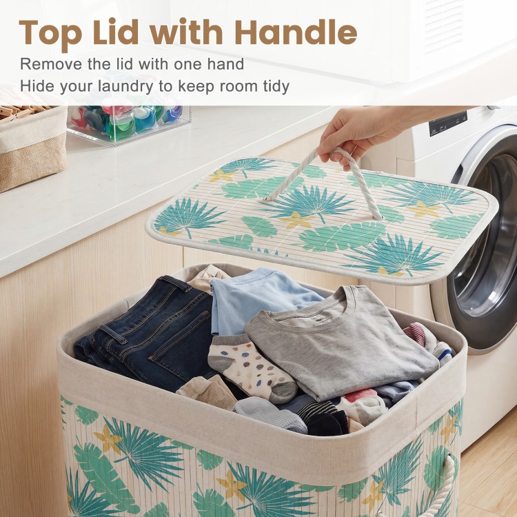 Bamboo clothes hamper with removable liner, featuring a green rainforest pattern and top lid for easy laundry storage.