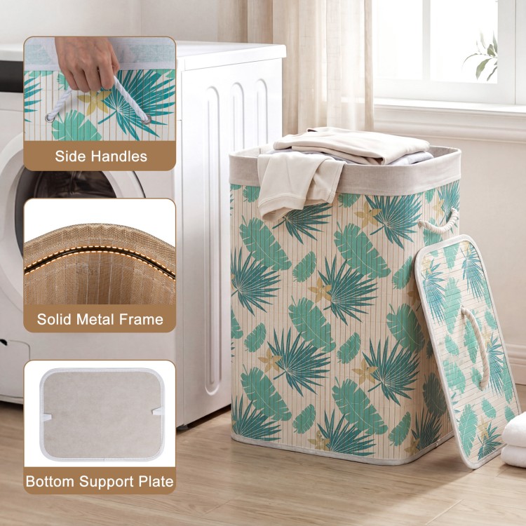 Bamboo clothes hamper with removable liner, featuring a rainforest pattern, side handles, and solid metal frame for.