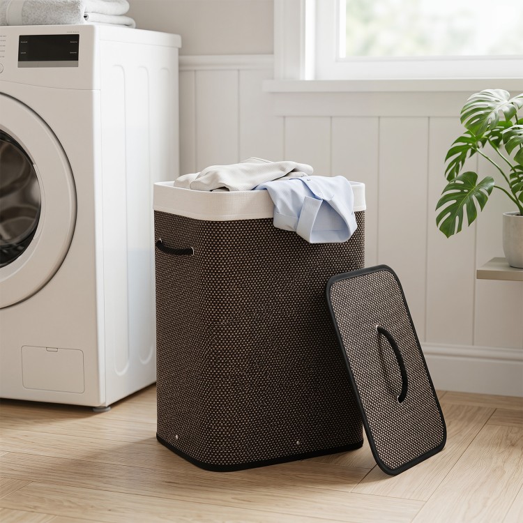 Bamboo clothes hamper with removable liner, 19-gal capacity, portable handles, ideal for laundry rooms and bedrooms.