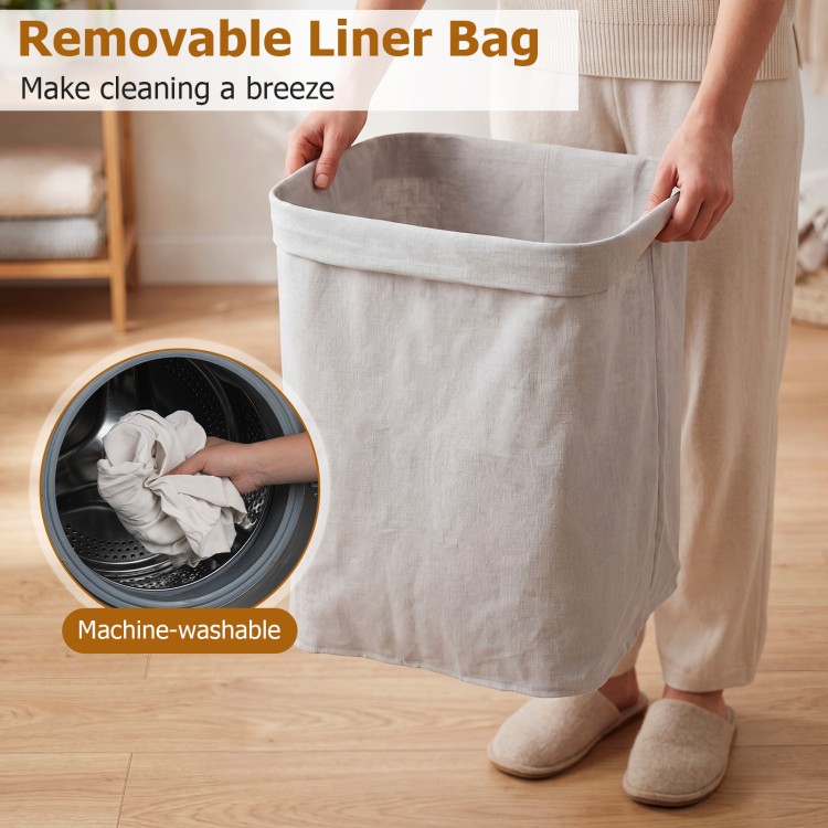 Black bamboo clothes hamper with removable liner, portable handles, and 19-gal capacity for easy laundry storage.