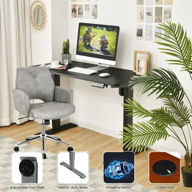 Adjustable electric standing desk in black featuring a sturdy heavy-duty base and cable management hole for organized.