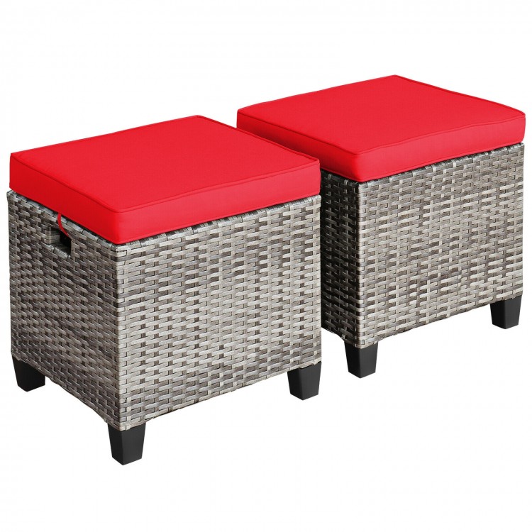 Set of 2 outdoor rattan ottomans with removable red cushions, perfect for patio and garden use.