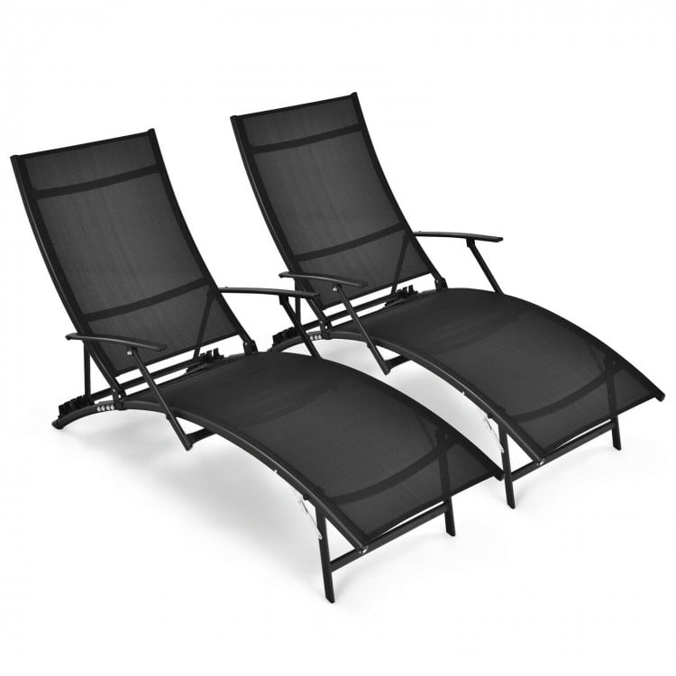 Two black folding stackable lounge chairs with armrests and adjustable backrests, perfect for outdoor relaxation.