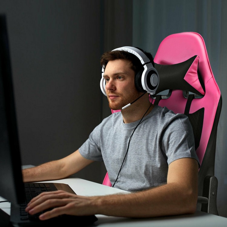 Gaming chair in pink PU leather with adjustable features, USB massage lumbar pillow, and retractable footrest for.