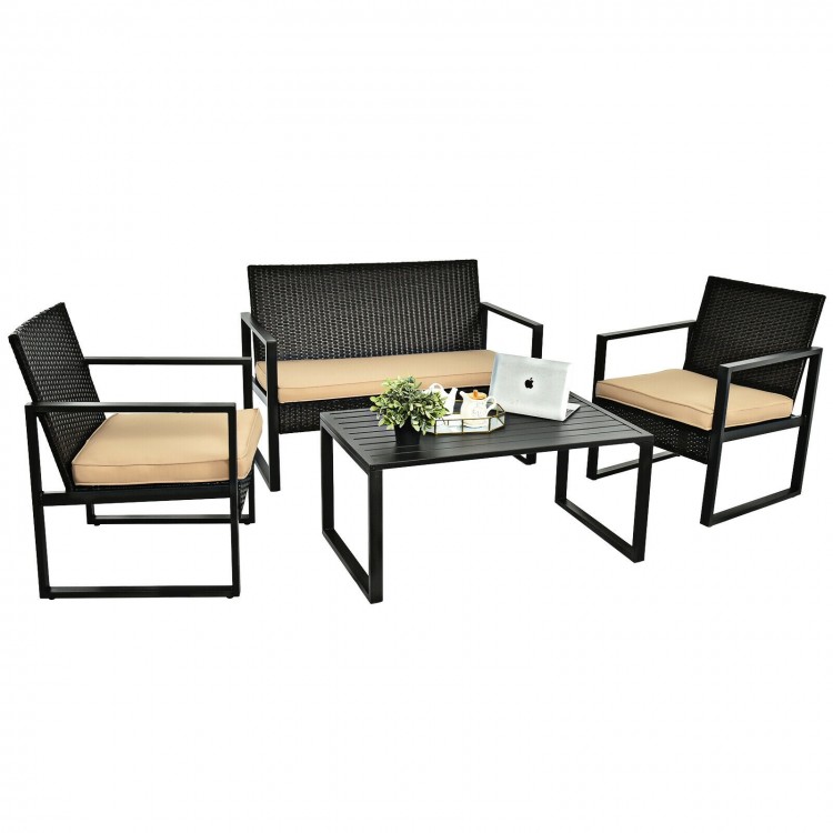 4-piece patio rattan furniture set with cushioned sofa and coffee table, perfect for outdoor and indoor use.