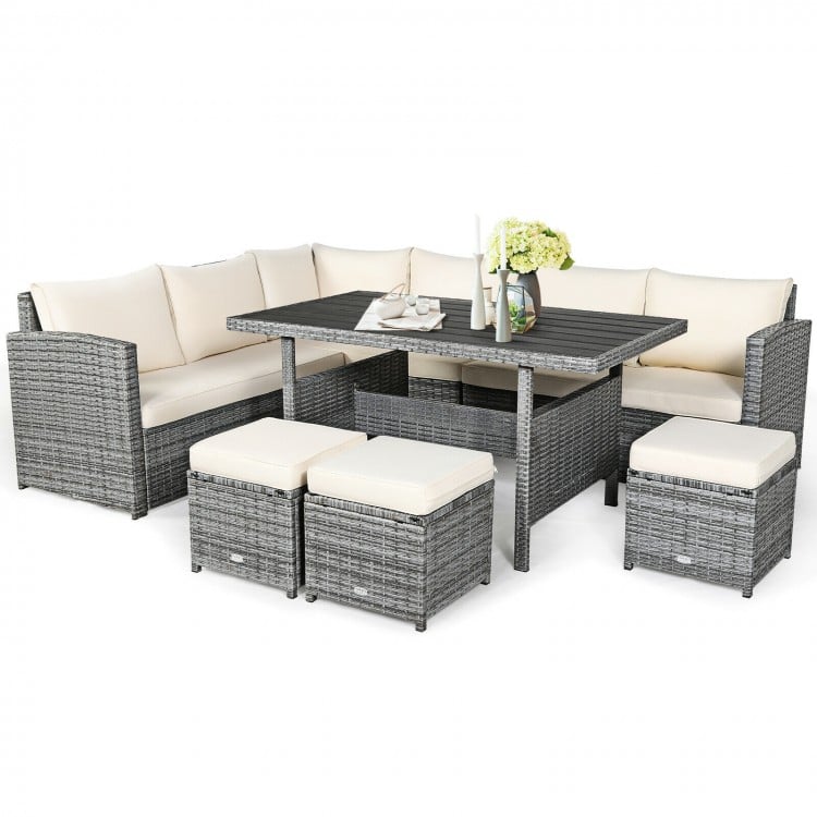 7-piece all-weather patio rattan dining set with off-white cushions, including sectional sofa, table, and ottomans for.