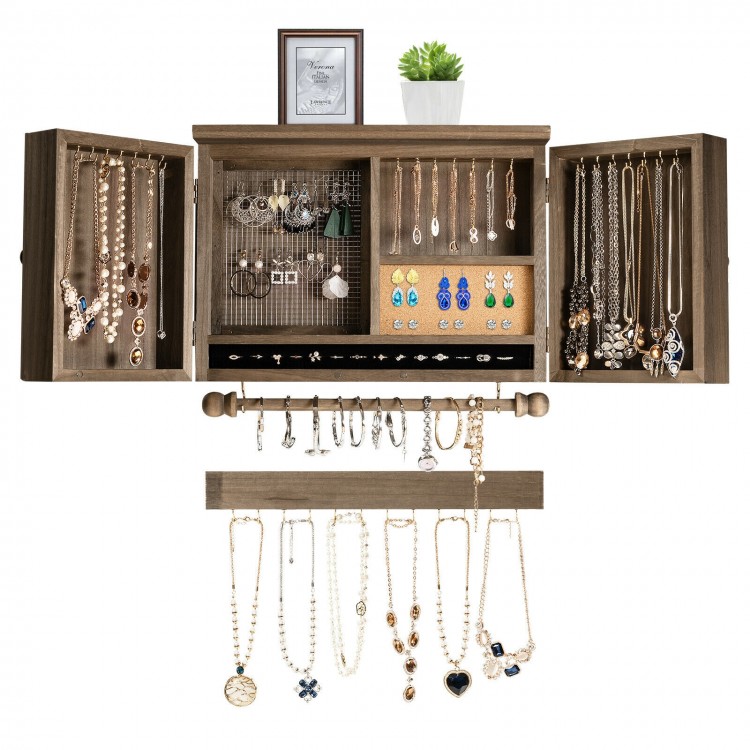Vintage wood wall-mounted jewelry organizer with barn doors, featuring hooks and mesh for necklaces and earrings.