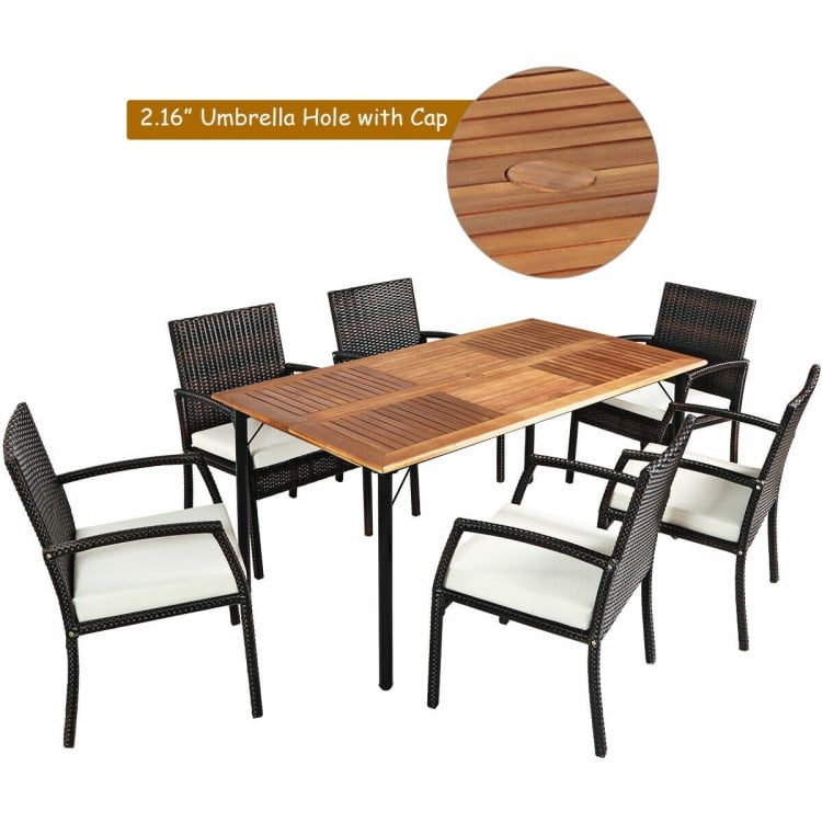 7-piece patio dining set featuring a spacious acacia wood table and 6 cushioned armchairs with an umbrella hole for.