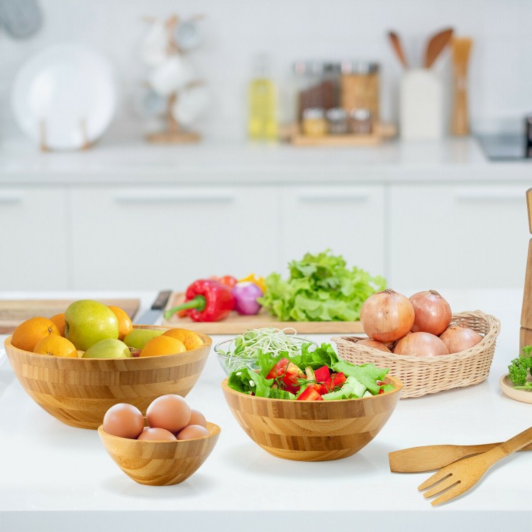 Bamboo salad bowl set with three sizes, ideal for serving salad, fruits, and snacks in a natural finish.