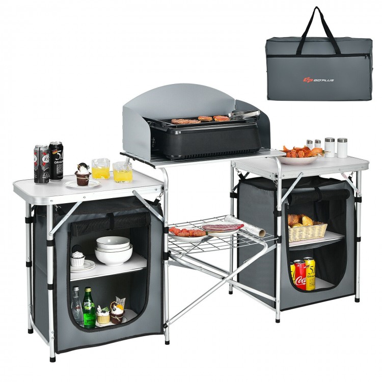 Folding camping table with storage organizer in gray, featuring side tables and a heat-resistant countertop for outdoor.
