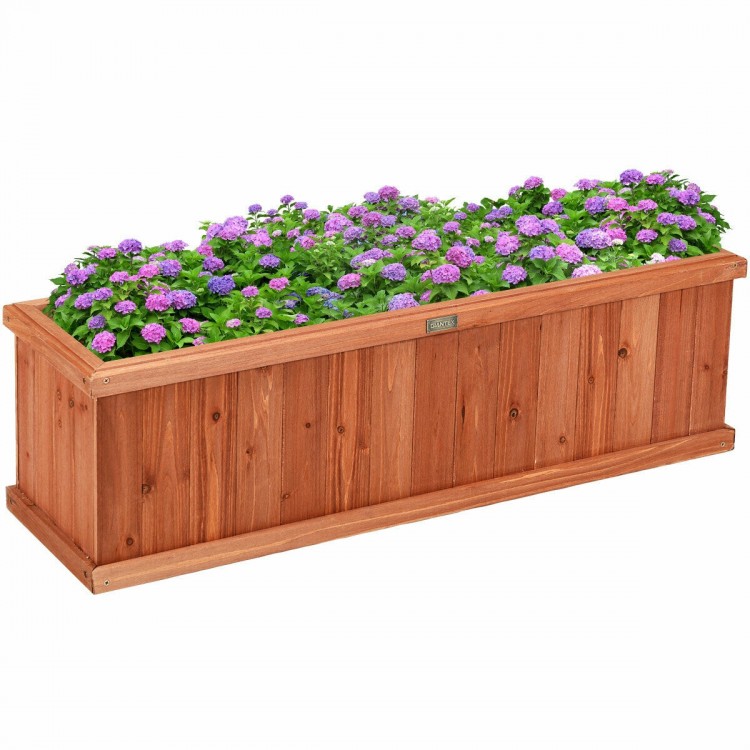 Wooden decorative planter box filled with purple flowers, made from natural fir, ideal for indoor or outdoor use.