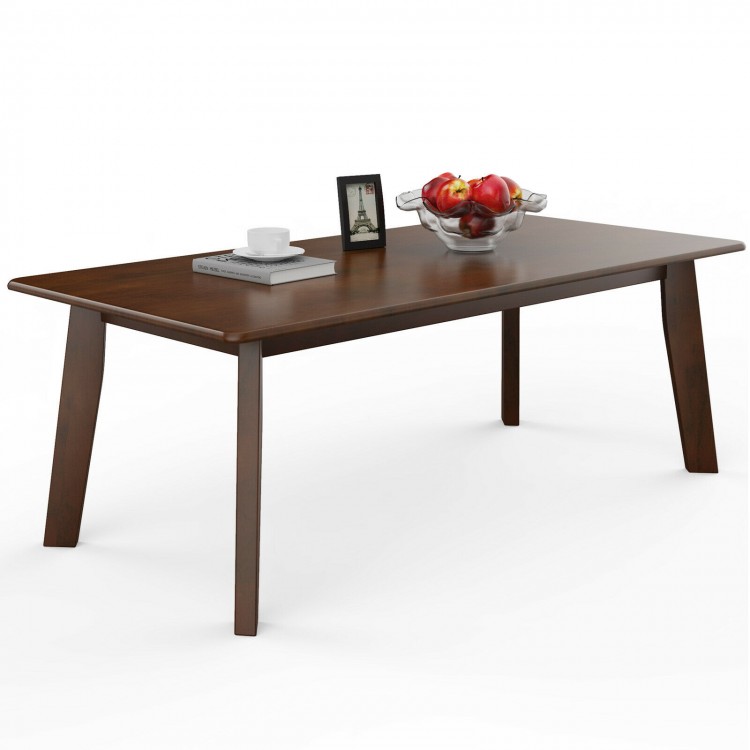 Rectangular wooden coffee table with rubber legs, featuring a large scratch-resistant tabletop for versatile use.