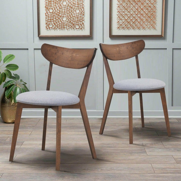 Set of 2 dining chairs with upholstered curved back and rubber wood legs, ideal for kitchen or dining room use.