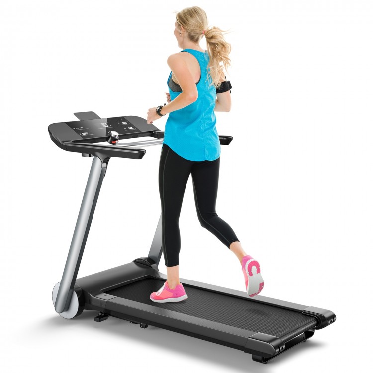 Folding treadmill with LED display, adjustable speed, and shockproof belt, ideal for home workouts.