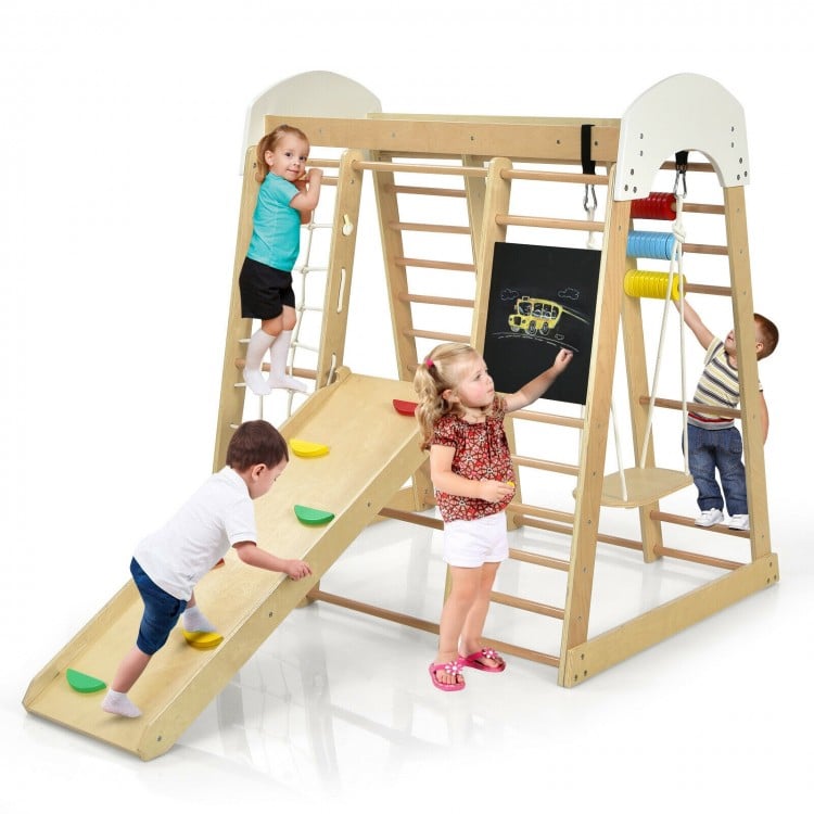 Wooden 8-in-1 indoor playground climber playset with slide, climbing holds, and chalkboard for children's active play.