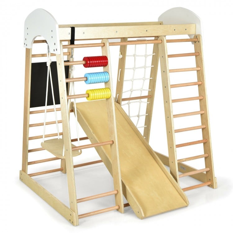 Wooden indoor playground climbing gym with a sturdy structure, slide, and colorful climbing holds for children's active.