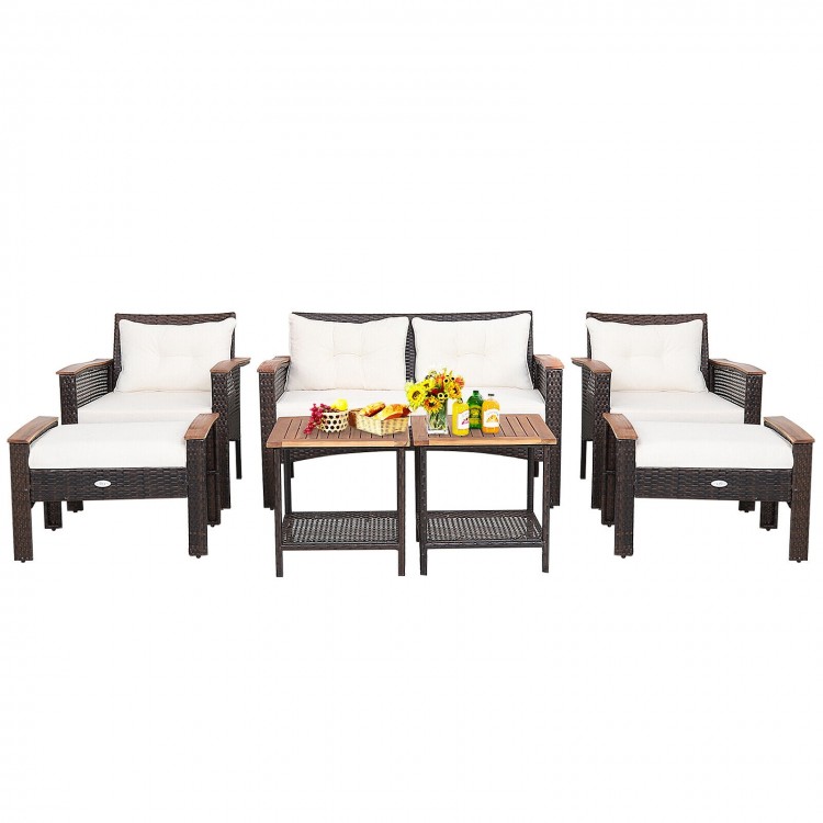 7-piece patio rattan cushioned furniture set with 2 armchairs, loveseat, and tables, perfect for outdoor relaxation.