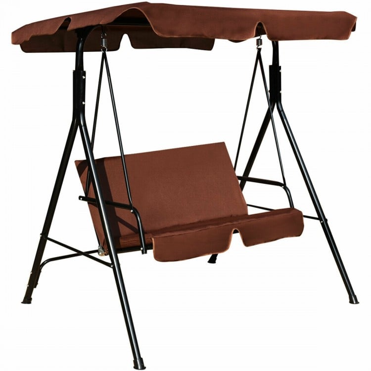 Cushioned loveseat swing glider with a waterproof canopy and sturdy black steel frame for outdoor relaxation.