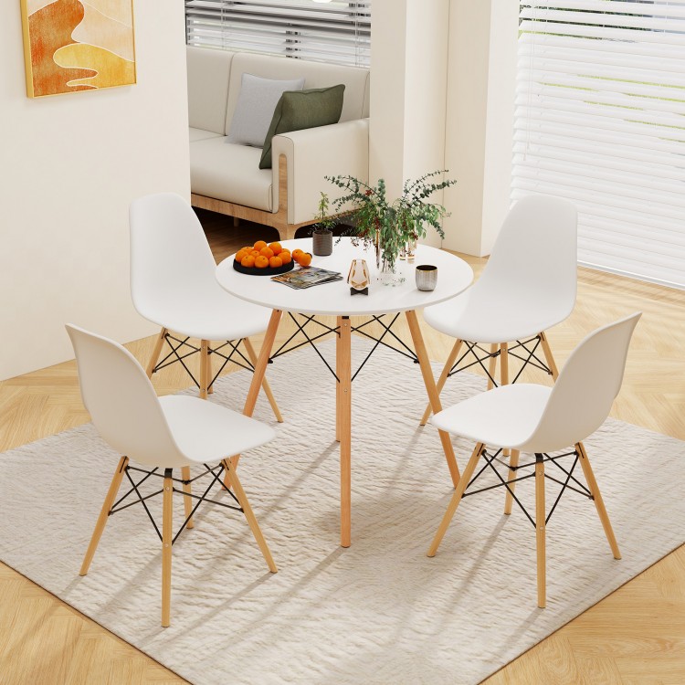 Round modern dining table with solid beech wood legs, 31.5 inches, designed for compact spaces and easy cleaning.