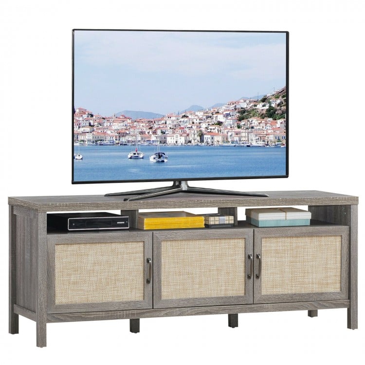 Gray universal TV stand with three cabinets and open shelf, designed for TVs up to 65 inches, perfect for storage and.