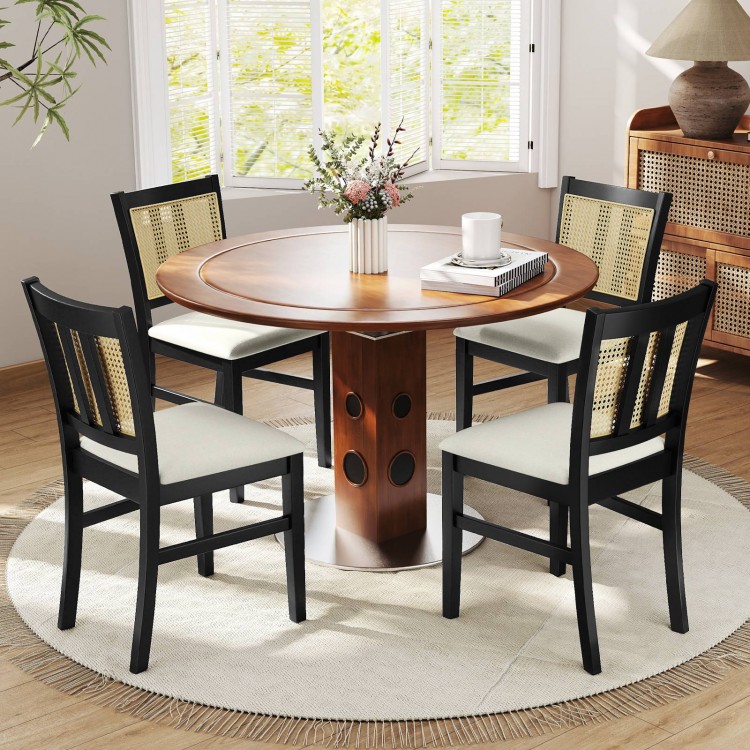 Farmhouse rattan dining chair set with rubber wood legs and cane backs, featuring beige padded seats for comfort.