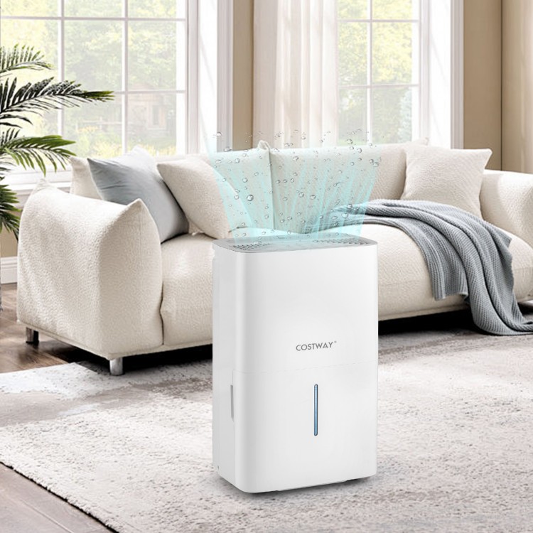 65 pints dehumidifier in white with LED display, placed in a cozy living room for effective humidity control.
