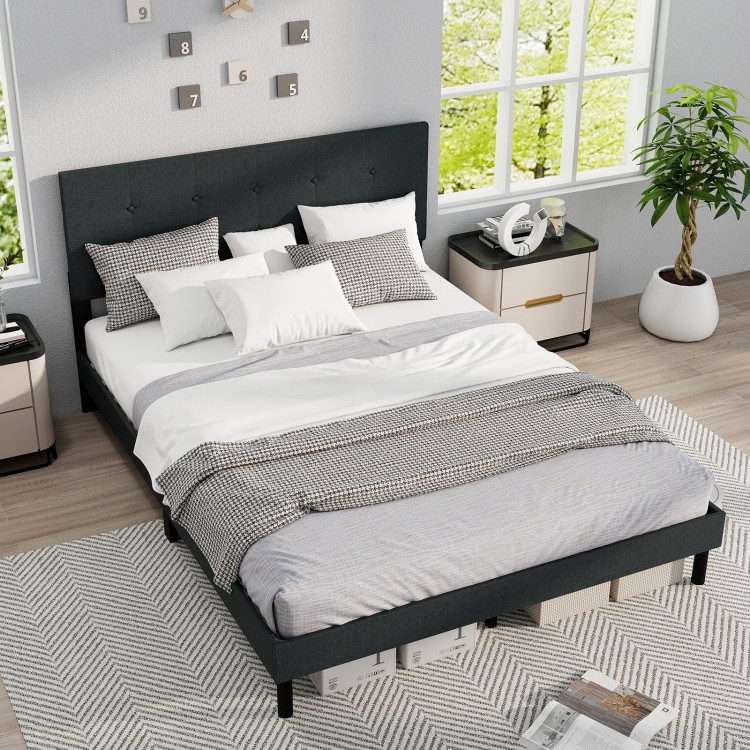 Queen size upholstered bed frame in dark gray with tufted headboard, sturdy slats, and ample under-bed space for.