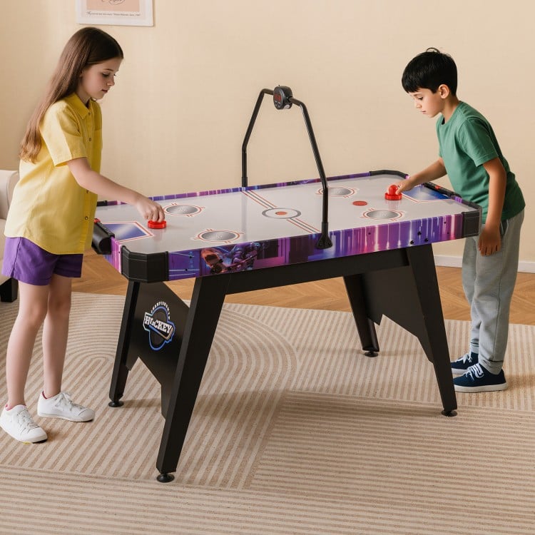 56-inch air hockey table with LED scoreboard, featuring two players in action and a sturdy design for kids'.