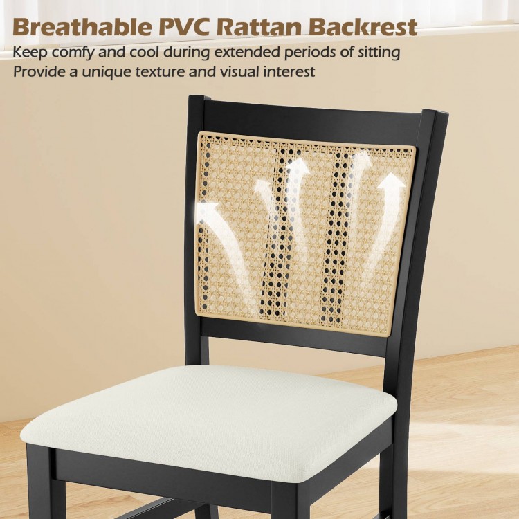 Breathable PVC rattan backrest of a farmhouse dining chair, offering comfort and unique texture for stylish seating.