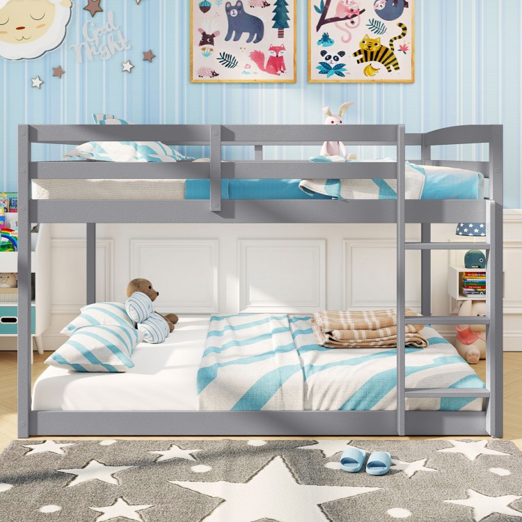 Gray full over full low-to-ground bunk bed featuring ample spacing between beds for comfortable sleeping and activities.