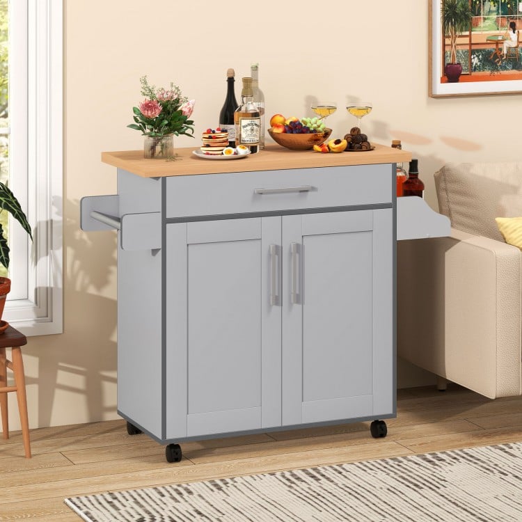 Rolling kitchen island cart in gray with spacious countertop, drawer, and adjustable cabinet shelf for organized.