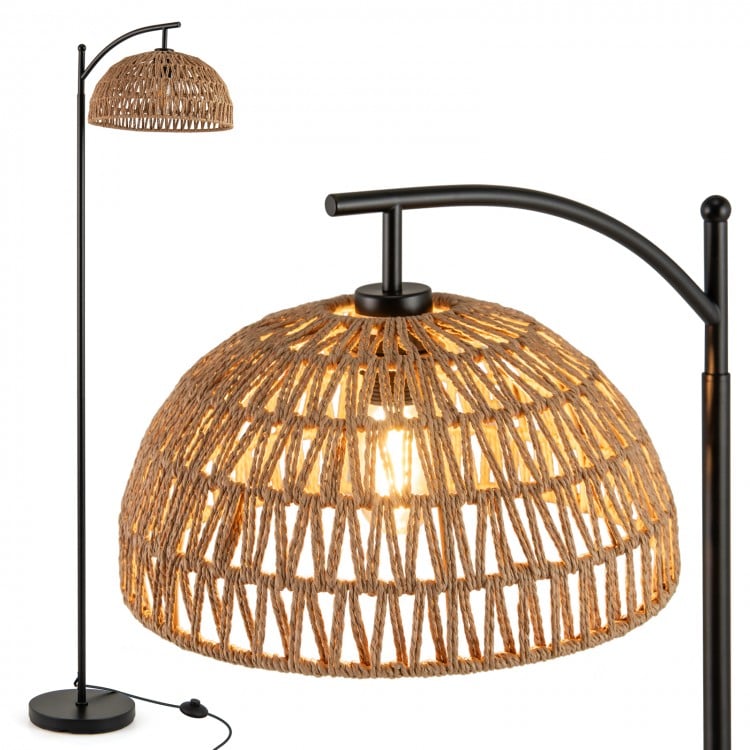 Arc floor lamp with a black metal base and woven hanging lampshade, ideal for living room or bedroom lighting.