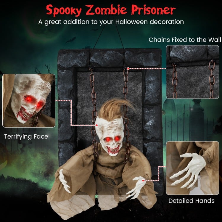 Hanging animated zombie prisoner decoration with glowing red eyes, detailed hands, and sound-activated features for.