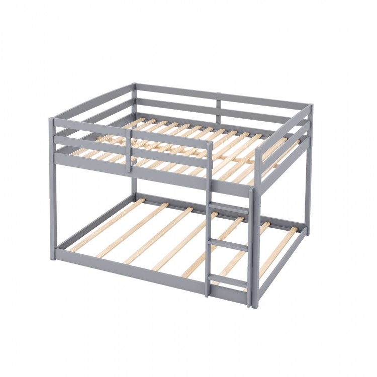 Gray full over full low-to-ground bunk bed with solid wood frame and guardrails, ideal for kids' safety and easy access.