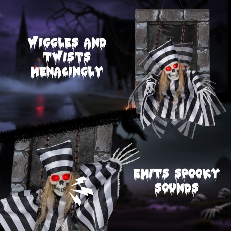 Animated 18-inch hanging skull prisoner decoration with LED eyes, spooky sounds, and menacing movements for Halloween.
