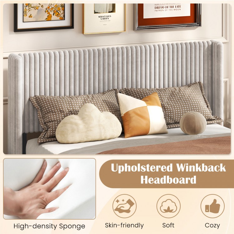 Upholstered wingback headboard in plush velvet with vertical channel design, perfect for queen size bed frames.