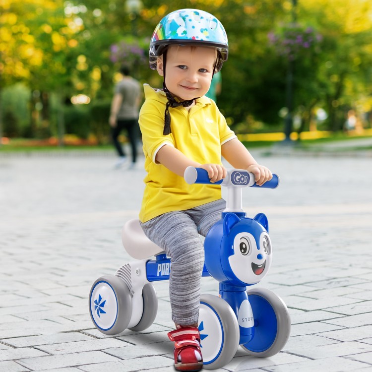 Blue baby balance bike with four wheels, lightweight carbon steel frame, and comfortable seat for safe riding.