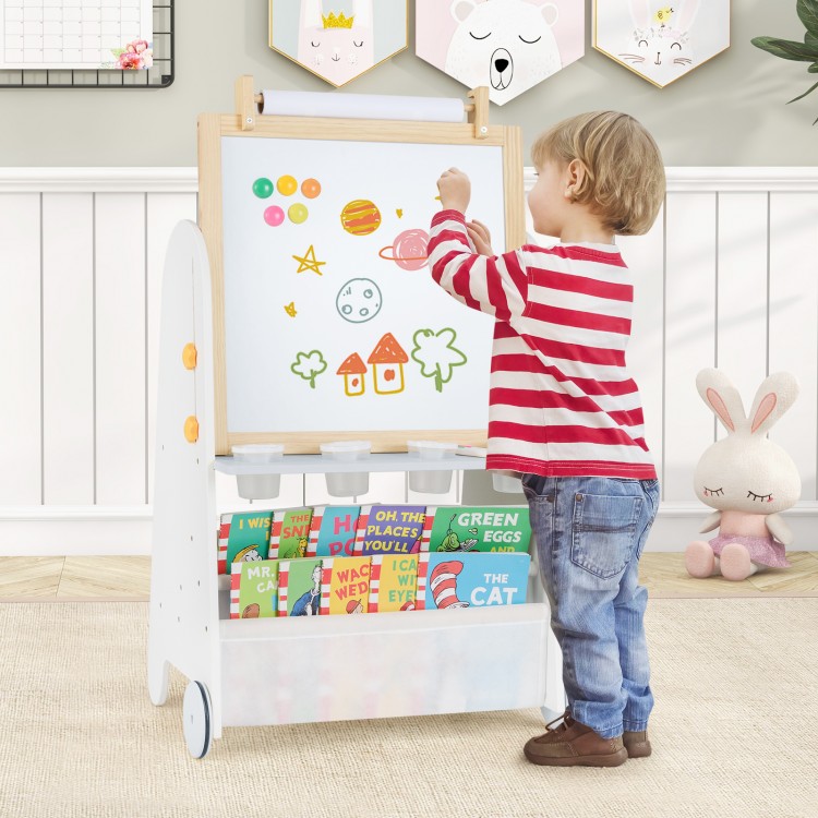 Toddler using the 4-in-1 activity table set with magnetic whiteboard and chalkboard for creative play and drawing.