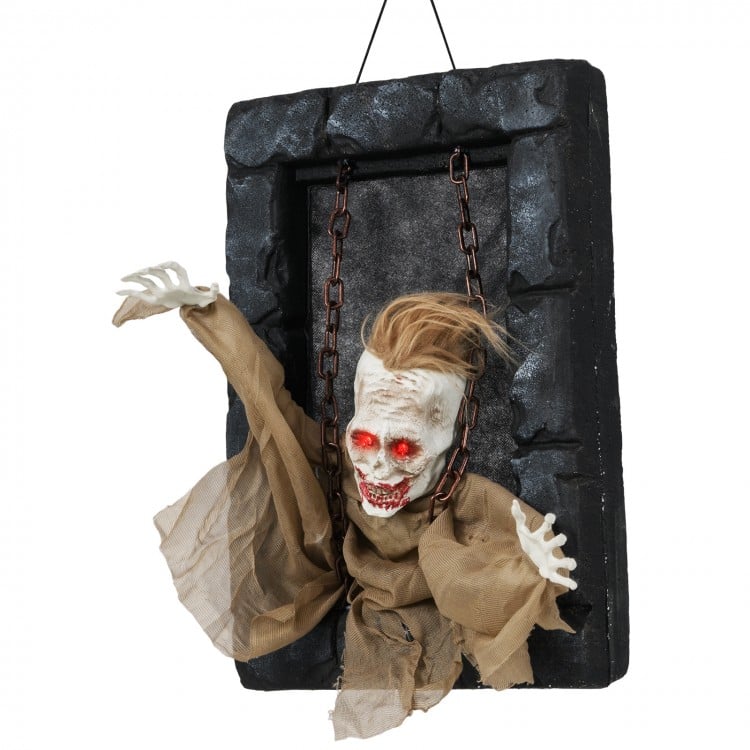 Hanging animated zombie prisoner decoration with glowing red eyes, creepy sounds, and detailed features for Halloween.