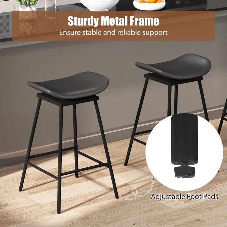 Backless swivel barstool set in black faux leather with sturdy metal frame and adjustable foot pads, ideal for kitchen.