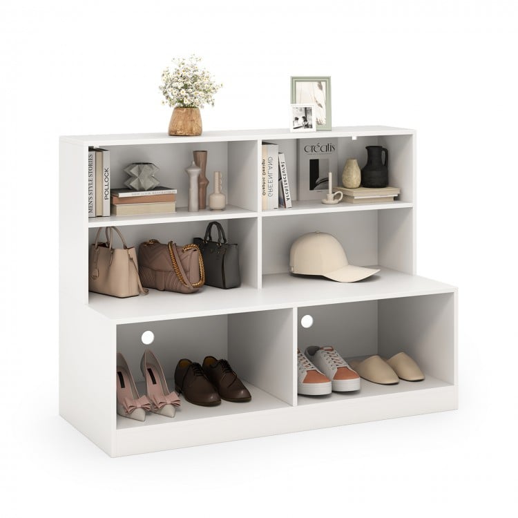 White entryway shoe cabinet featuring 4 storage cubes and 2 compartments for shoes, perfect for tidy organization.