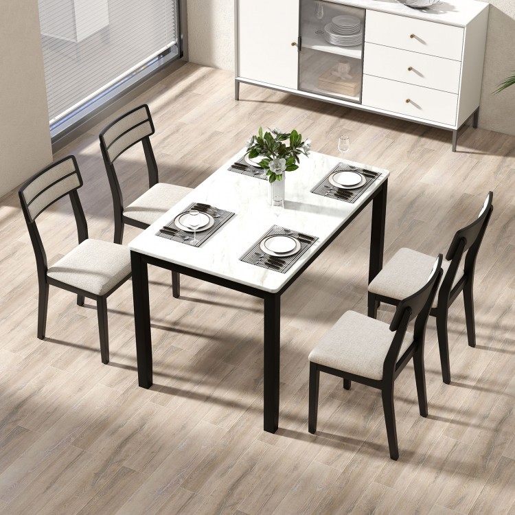 Set of 4 modern dining chairs with tilt backrest, black rubber-wood legs, and padded seats for dining room comfort.