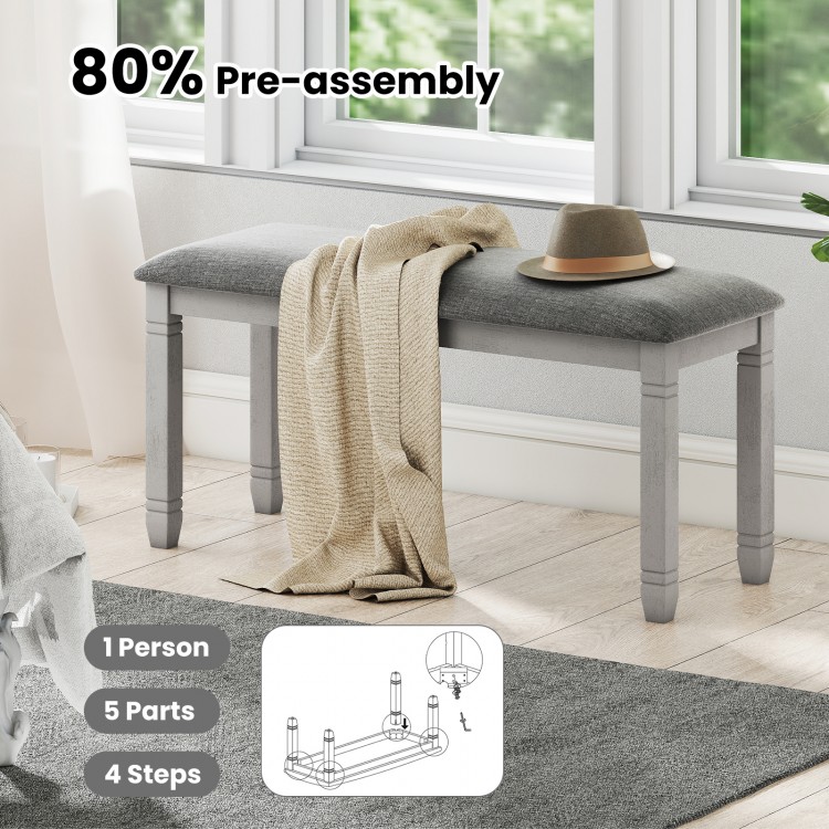 Upholstered gray bedroom bench with padded seat and solid wood legs, 80% pre-assembled for easy setup and stylish.