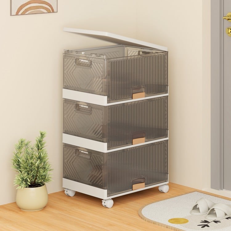Three-cube stackable storage bin with detachable wheels, featuring a top and front opening for easy access and mobility.