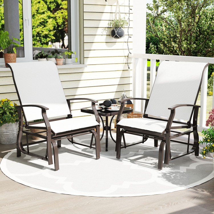 Two outdoor glider chairs with beige fabric and ergonomic backrests, perfect for relaxing on the patio or porch.