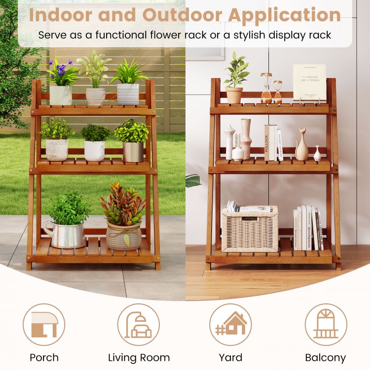 Foldable 3-tier solid wood plant stand with slatted shelves, ideal for patio or balcony plant display and home decor.