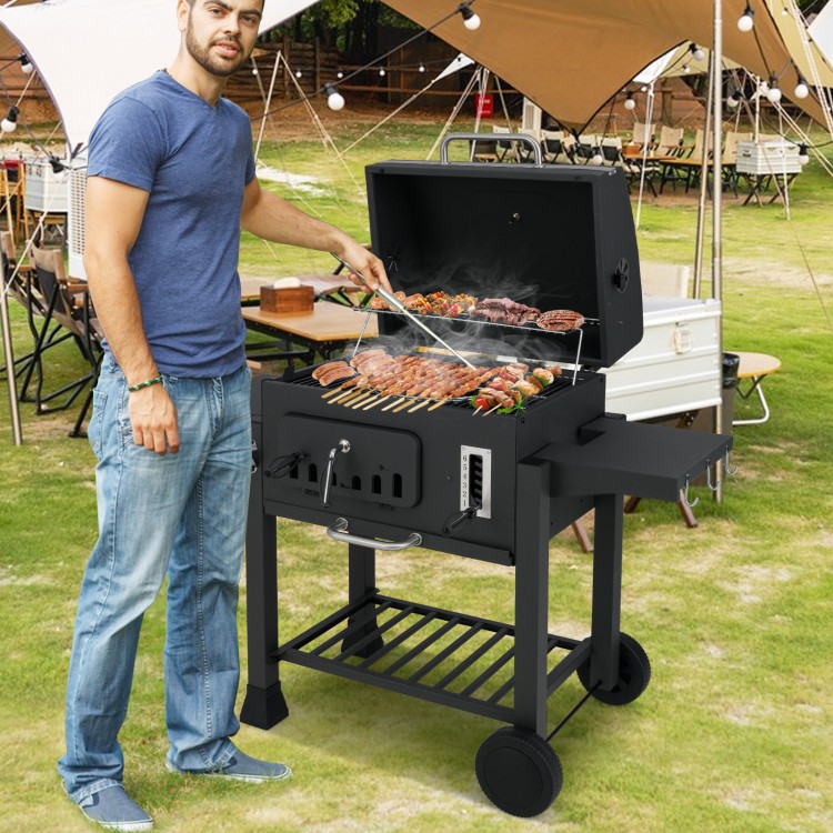 24-inch barrel charcoal grill with 544 sq.in cooking area, featuring 2 folding side tables and adjustable air vents.
